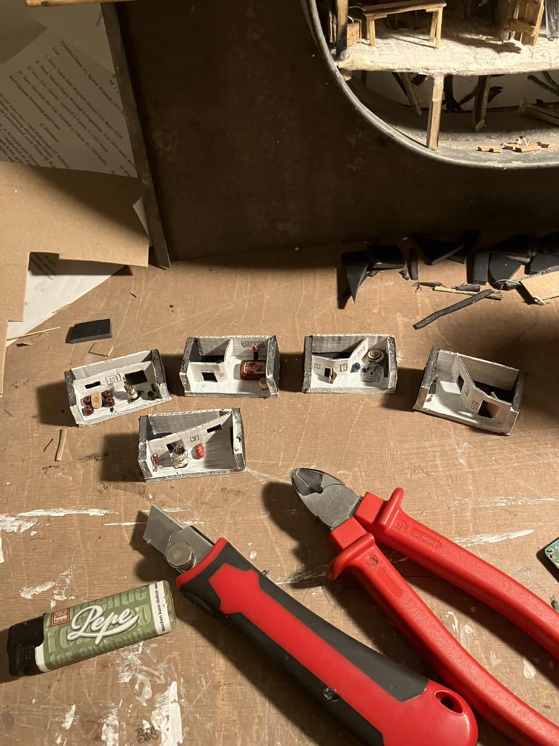 Several miniature apartments before installation in the building