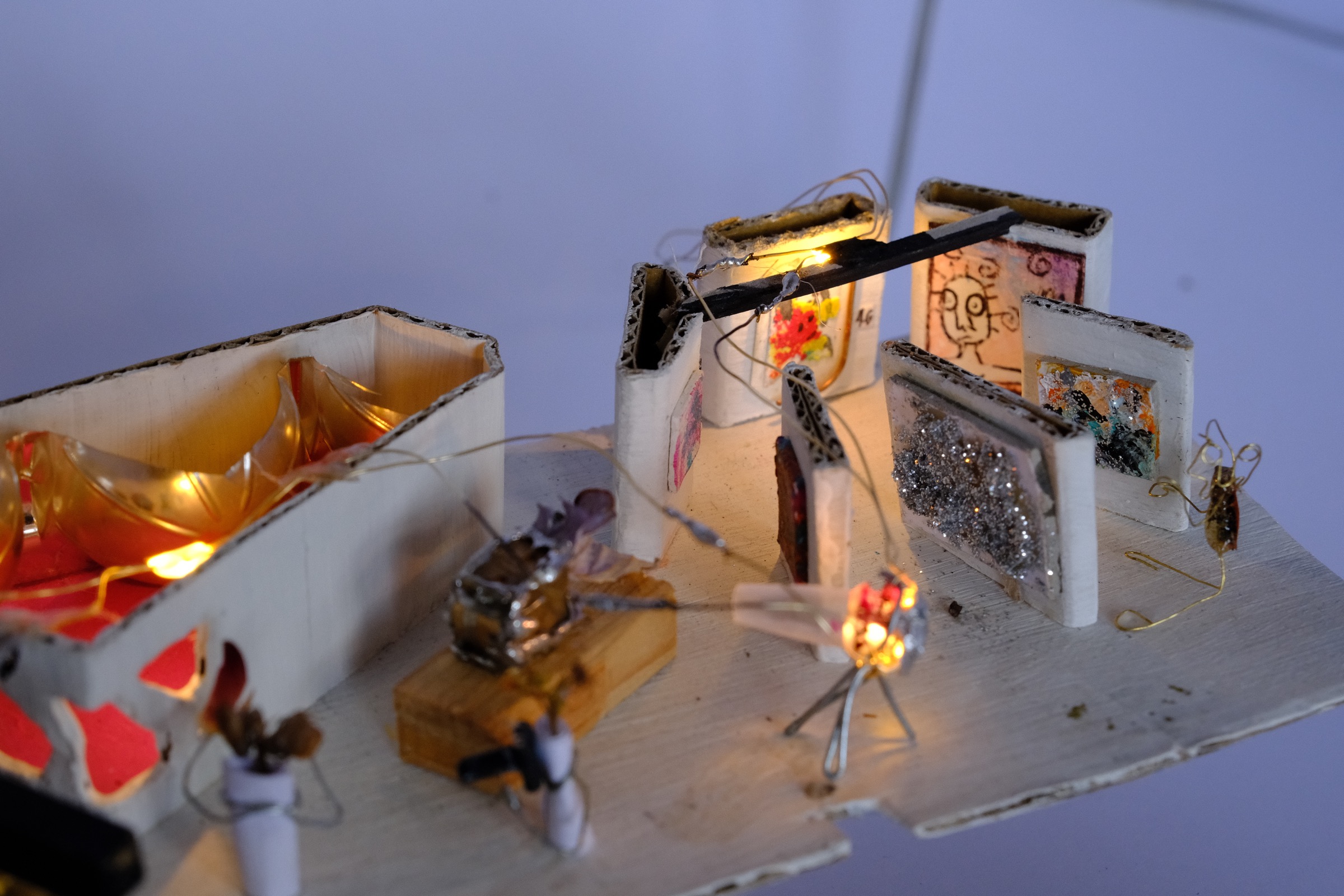 Close up of Savi’s miniature artwork in the exhibition