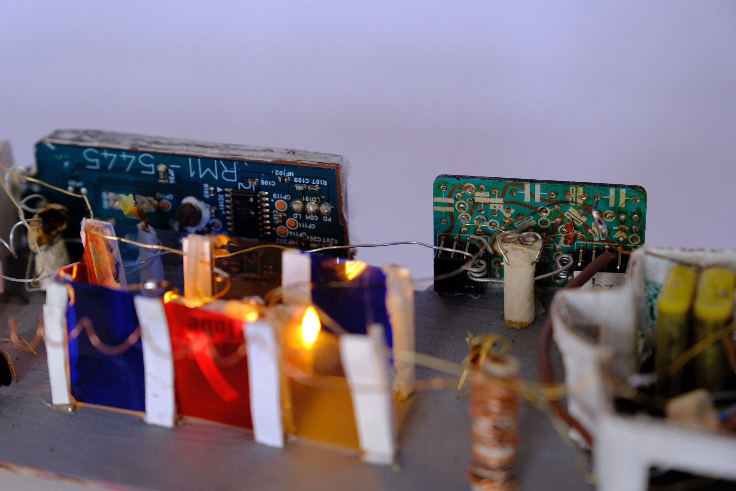 Cigarette figure with glasses operating the light controller