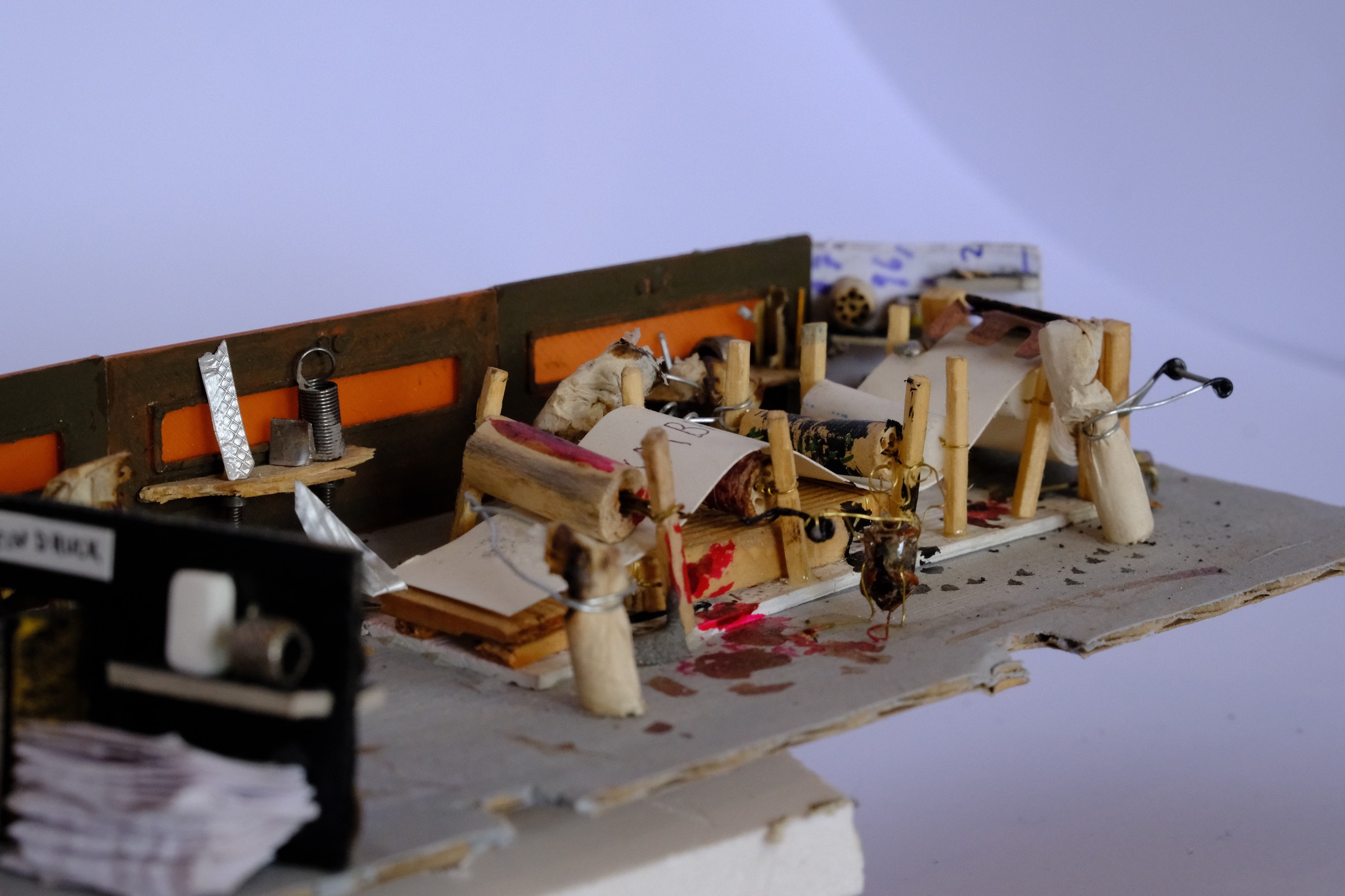 Beetle figure operating the miniature printer