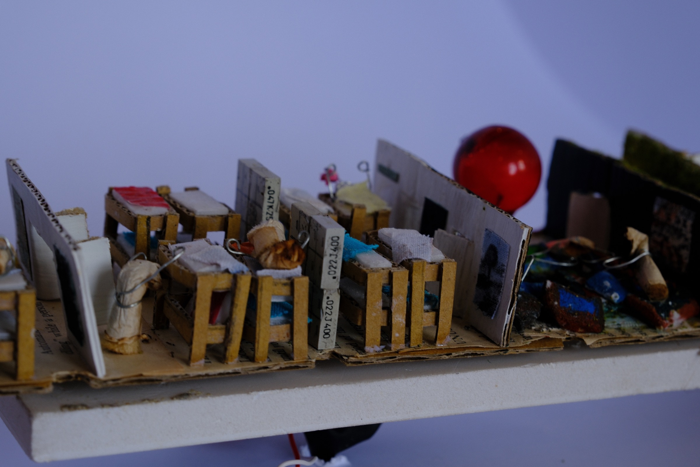 Miniature beds on the sleeping level
