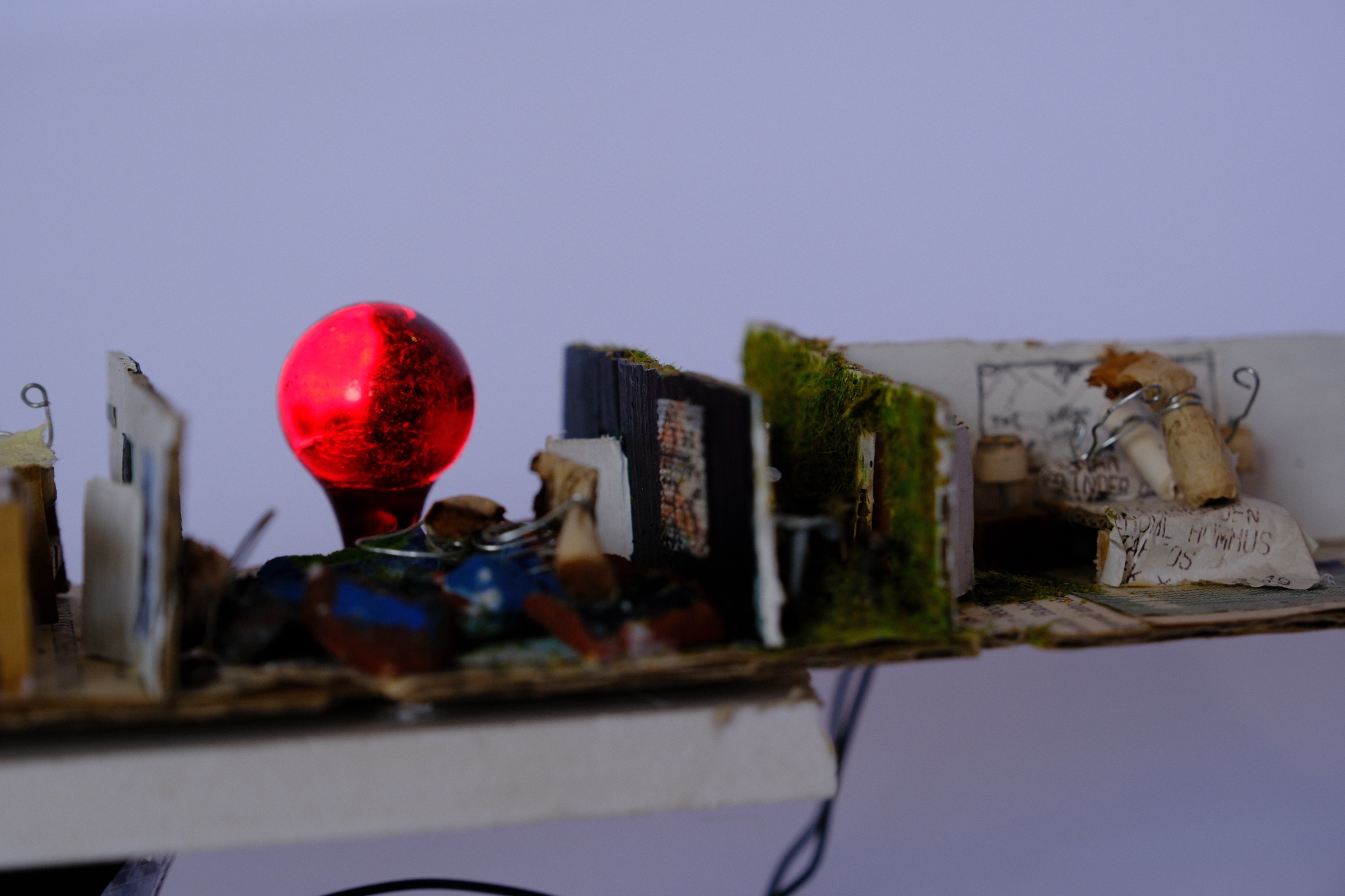 Glowing red orb that helps the figures sleep